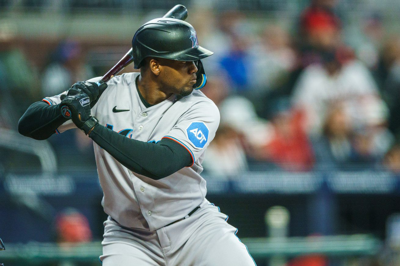 Jorge Soler #12 of the Miami Marlins at bat during the sixth inning against the Miami Marlins at Truist Park on April 26, 2023 in Atlanta, Georgia.