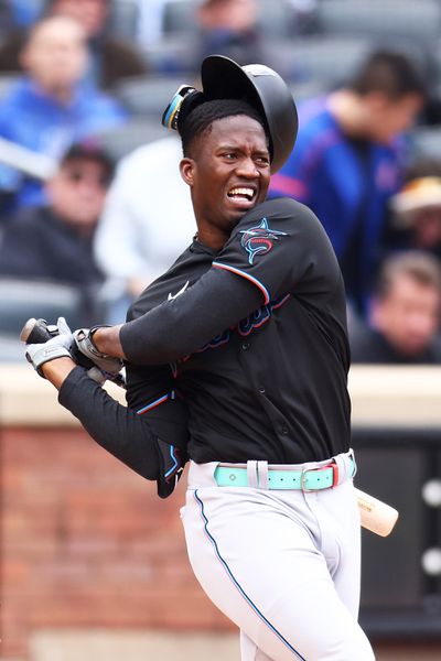 Jesus Sanchez #7 of the Miami Marlins swings and misses a pitch during an at bat in the fourth inning against the New York Mets during the home opener at Citi Field on April 07, 2023 in the Flushing neighborhood of the Queens borough of New York City.