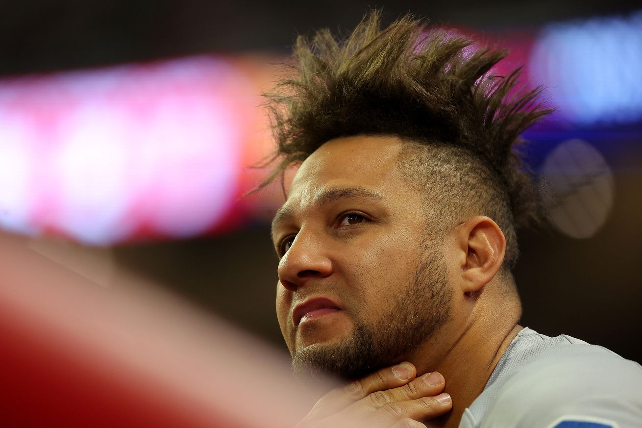 Yuli Gurriel #10 of the Miami Marlins looks on in the eighth inning against the Atlanta Braves at Truist Park on April 25, 2023 in Atlanta, Georgia.