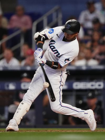 Luis Arraez #3 of the Miami Marlins bats in the game against the Atlanta Braves at loanDepot park on May 4, 2023 in Miami, Florida.