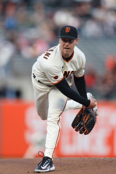 Anthony DeSclafani #26 of the San Francisco Giants pitches in the top of the first inning against the Washington Nationals at Oracle Park on May 08, 2023 in San Francisco, California.