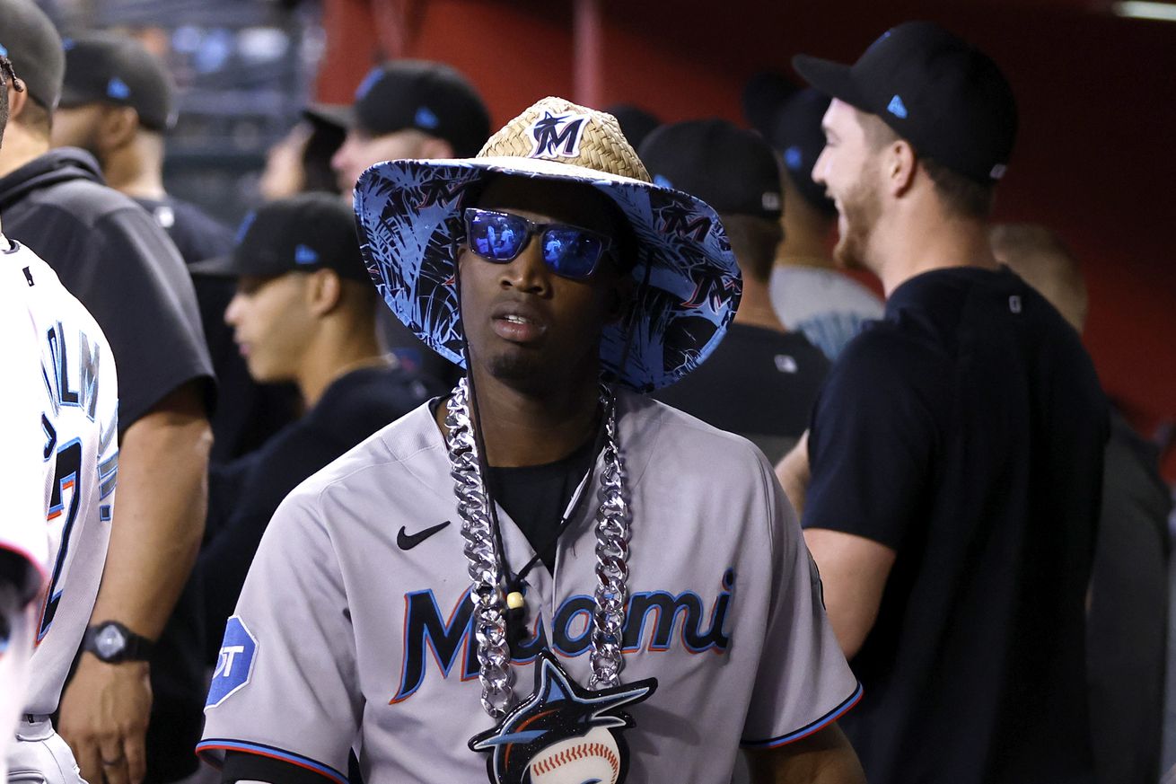 Jesus Sanchez #7 of the Miami Marlins walks in the dugout after hitting a three run home run against the Arizona Diamondbacks during the fourth inning at Chase Field on May 10, 2023 in Phoenix, Arizona.