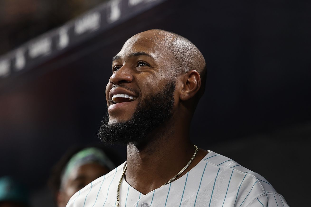 Bryan De La Cruz #14 of the Miami Marlins smiles after a homerun in the sixth inning against the Cincinnati Reds at loanDepot park on May 12, 2023 in Miami, Florida.