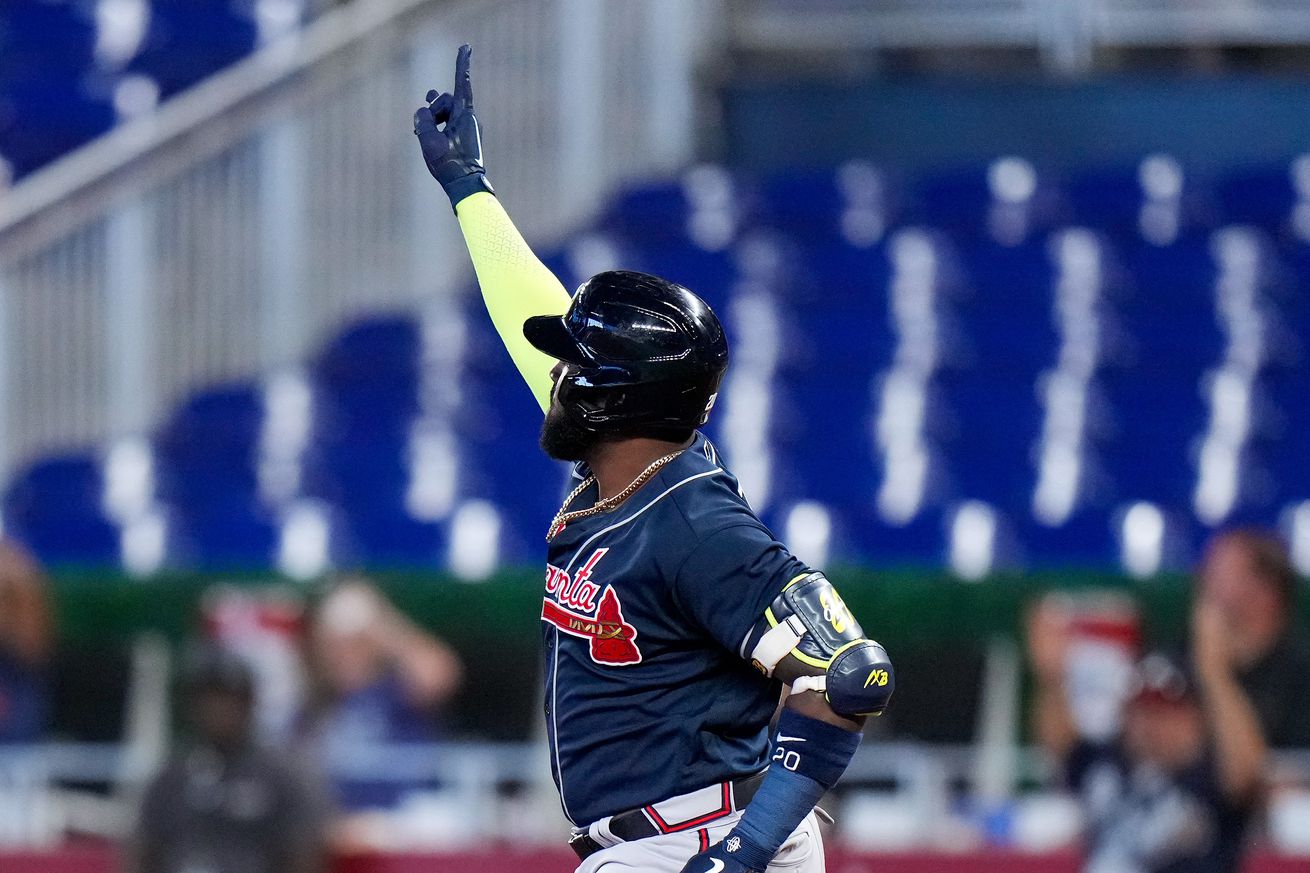 Atlanta Braves designated hitter Marcell Ozuna (20) runs the bases after hitting a home run against the Miami Marlins during the fourth inning at loanDepot Park.