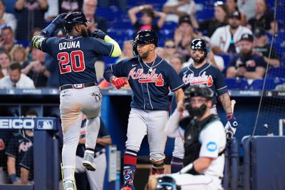 Atlanta Braves designated hitter Marcell Ozuna (20) celebrates with teammates after hitting a home run against the Miami Marlins during the fourth inning at loanDepot Park.