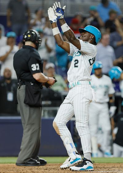 Miami Marlins center fielder Jazz Chisholm Jr. (2) scores after hitting a home run against the Cincinnati Reds during the fifth inning at loanDepot Park. 